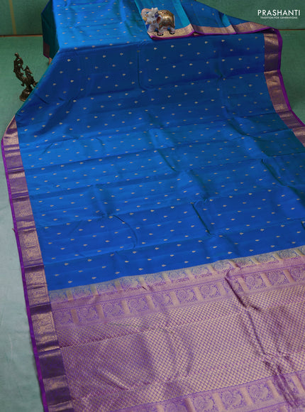 Pure kanchipuram silk saree dual tone blue and purple with allover zari woven buttas and zari woven annam border