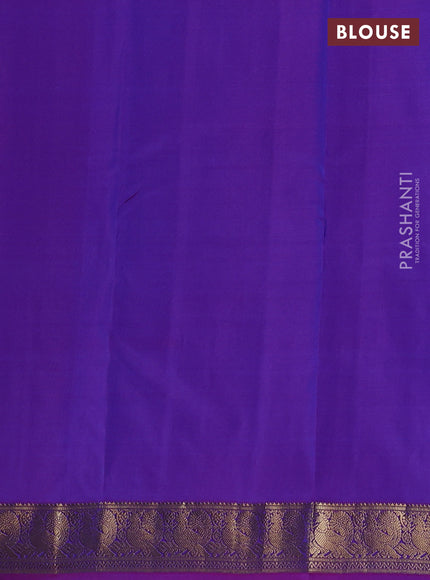 Pure kanchipuram silk saree dual tone blue and purple with allover zari woven buttas and zari woven annam border