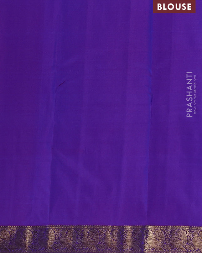 Pure kanchipuram silk saree dual tone blue and purple with allover zari woven buttas and zari woven annam border