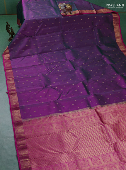 Pure kanchipuram silk saree dual tone greenish purple and pink with allover zari woven buttas and zari woven annam border