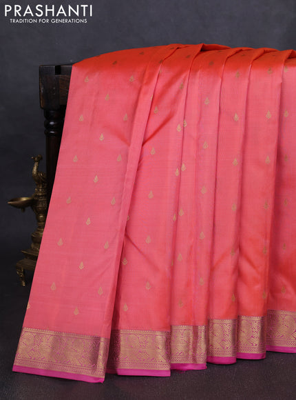 Pure kanchipuram silk saree peach shade and pink with allover zari woven buttas and zari woven annam border