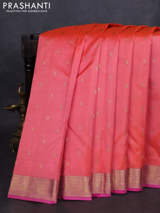 Pure kanchipuram silk saree peach shade and pink with allover zari woven buttas and zari woven annam border