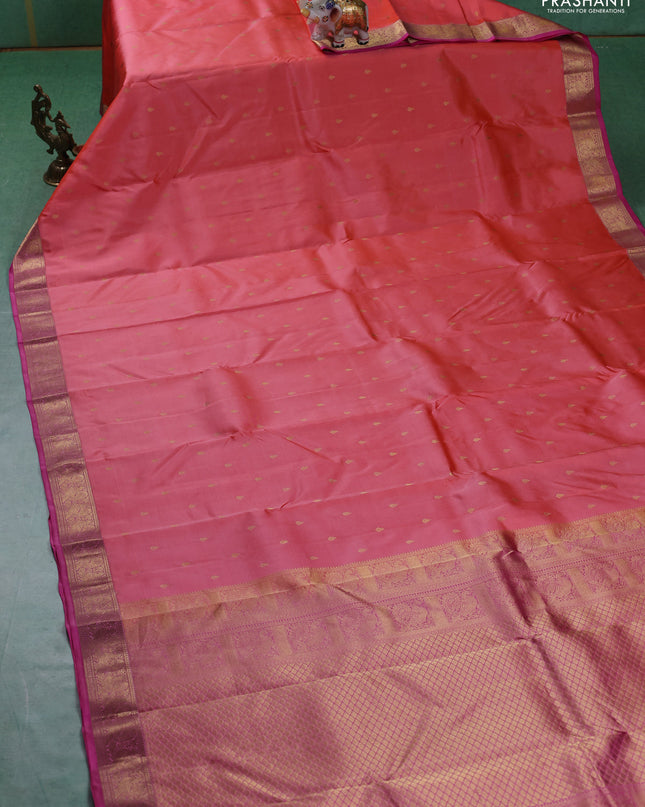 Pure kanchipuram silk saree peach shade and pink with allover zari woven buttas and zari woven annam border
