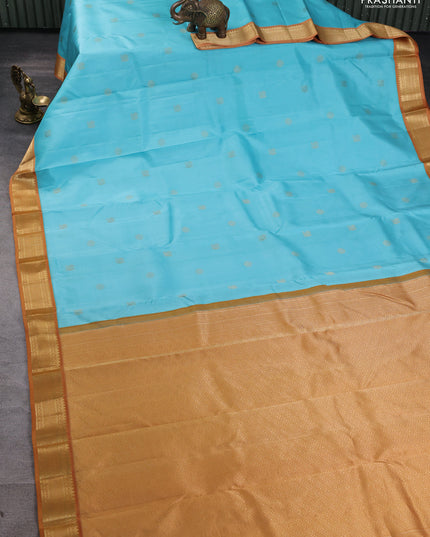 Pure kanchipuram silk saree light blue and dark mustard with annam & rudhraksha zari woven buttas and zari woven korvai border