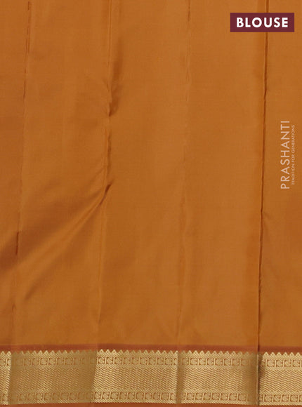 Pure kanchipuram silk saree light blue and dark mustard with annam & rudhraksha zari woven buttas and zari woven korvai border