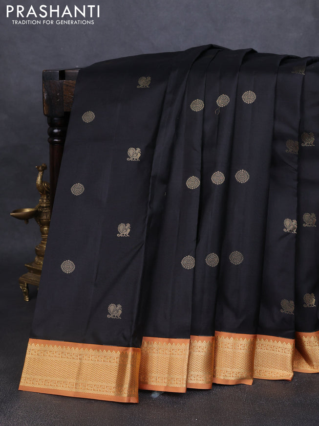 Pure kanchipuram silk saree black and dark mustard with annam & rudhraksha zari woven buttas and zari woven korvai border