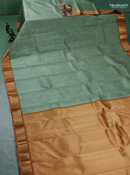 Pure kanchipuram silk saree pastel green and dark mustard with annam & rudhraksha zari woven buttas and zari woven korvai border