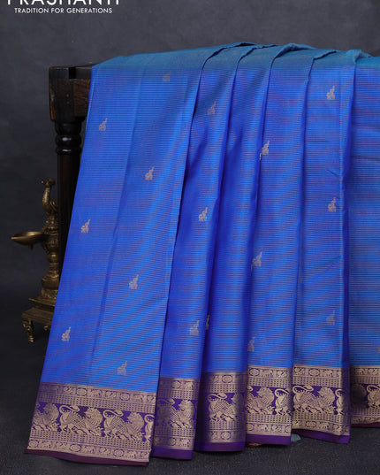 Pure kanchipuram silk saree blue and dual tone deep purple with allover vairaosi pattern & buttas and rich vansingaram zari woven border