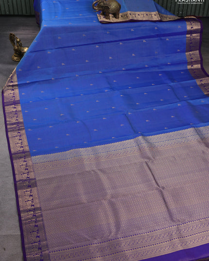 Pure kanchipuram silk saree blue and dual tone deep purple with allover vairaosi pattern & buttas and rich vansingaram zari woven border