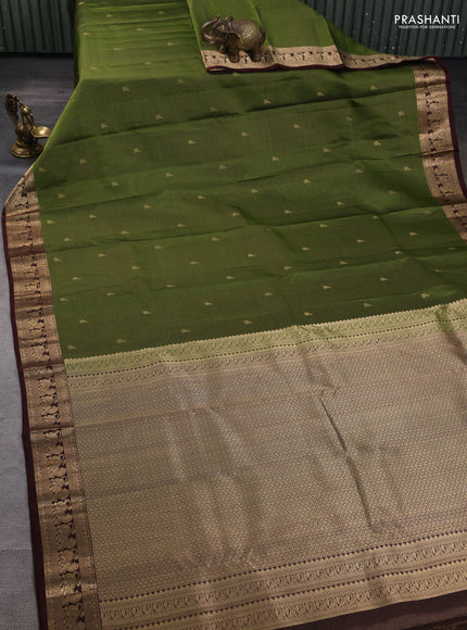 Pure kanchipuram silk saree green and coffee brown with allover vairaosi pattern & buttas and rich vansingaram zari woven border