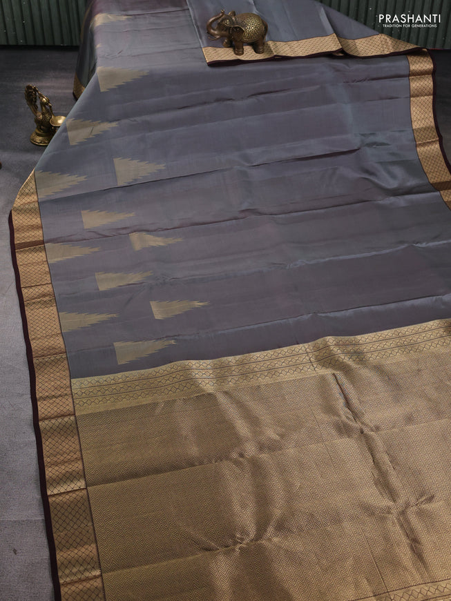 Pure kanchipuram silk saree grey and coffee brown with zari woven temple buttas and rich zari woven border
