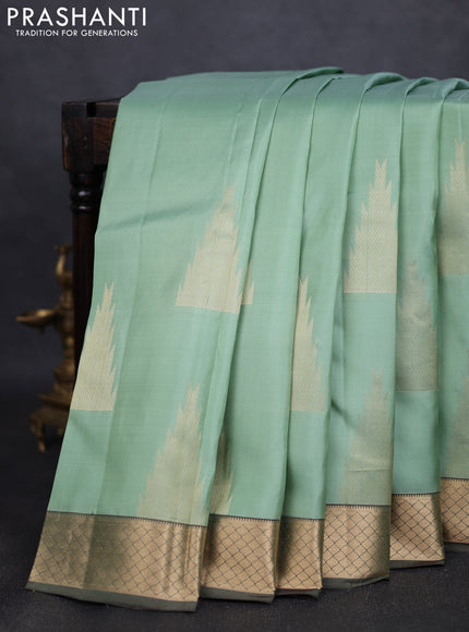 Pure kanchipuram silk saree pastel green with zari woven temple buttas and rich zari woven border