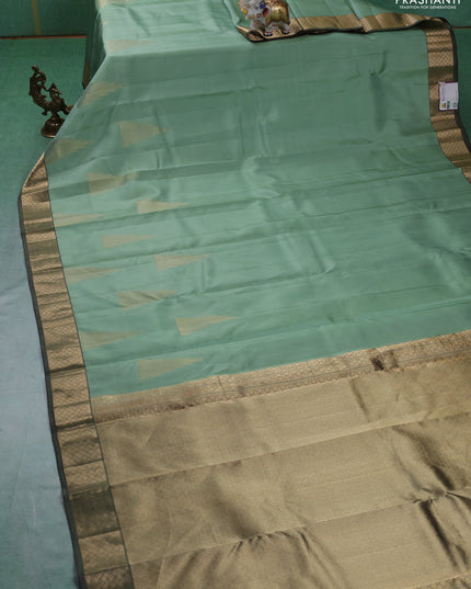Pure kanchipuram silk saree pastel green with zari woven temple buttas and rich zari woven border