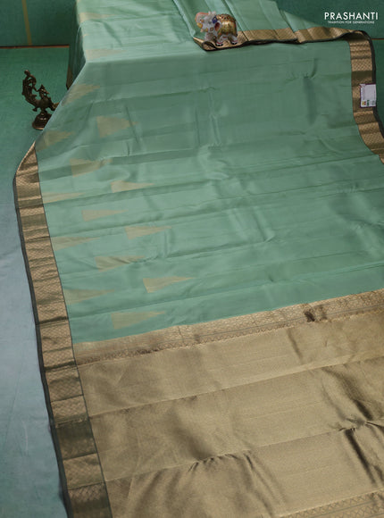 Pure kanchipuram silk saree pastel green with zari woven temple buttas and rich zari woven border