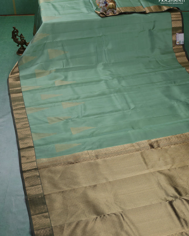 Pure kanchipuram silk saree pastel green with zari woven temple buttas and rich zari woven border