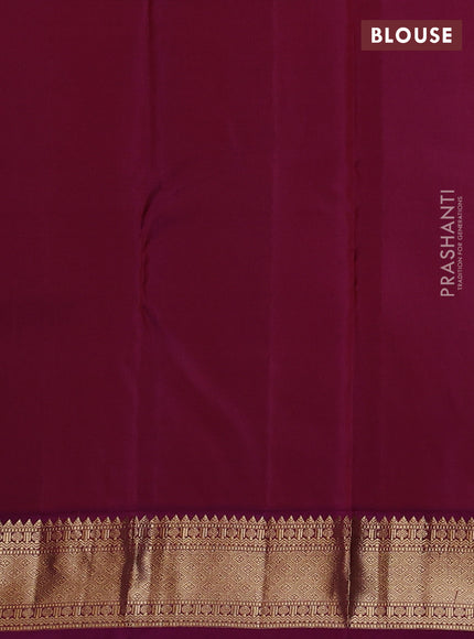 Pure kanchipuram silk saree bottle green and purple with zari woven buttas and zari woven korvai border