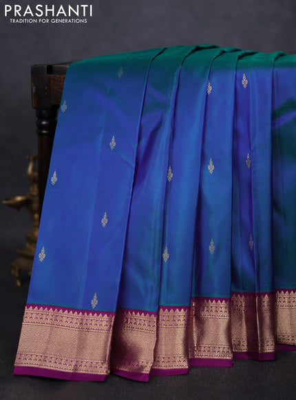 Pure kanchipuram silk saree dual tone bluish green and purple with zari woven buttas and zari woven korvai border