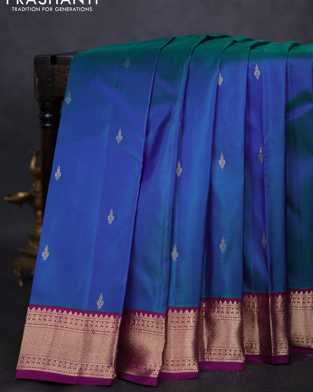 Pure kanchipuram silk saree dual tone bluish green and purple with zari woven buttas and zari woven korvai border