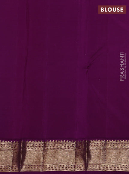 Pure kanchipuram silk saree dual tone bluish green and purple with zari woven buttas and zari woven korvai border