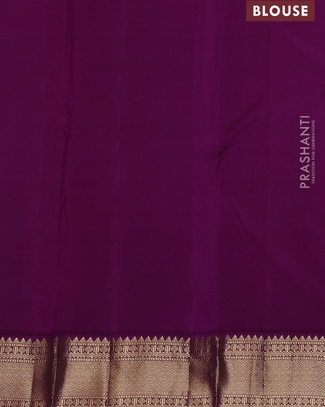 Pure kanchipuram silk saree dual tone bluish green and purple with zari woven buttas and zari woven korvai border
