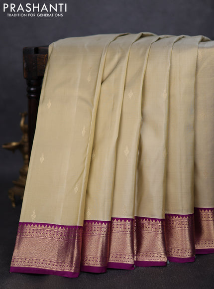 Pure kanchipuram silk saree elaichi green and purple with zari woven buttas and zari woven korvai border