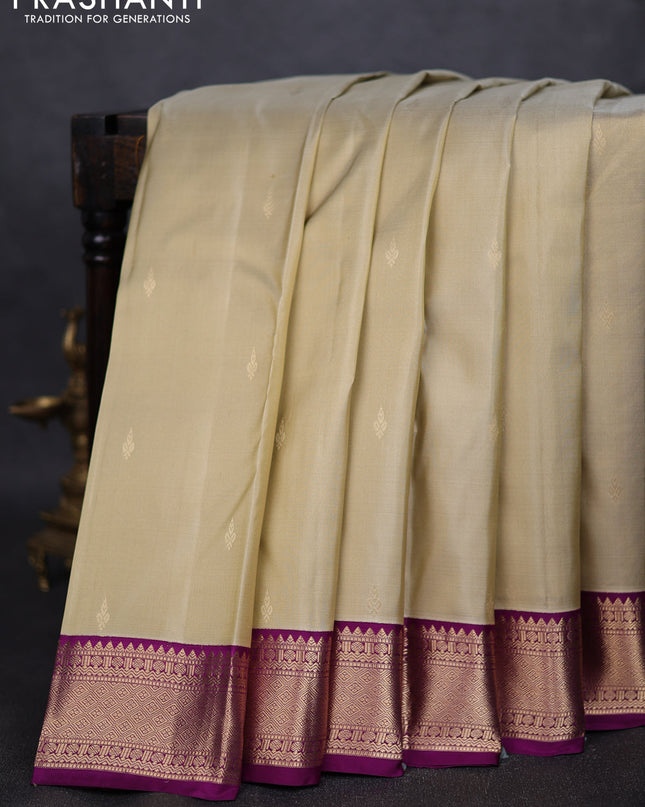 Pure kanchipuram silk saree elaichi green and purple with zari woven buttas and zari woven korvai border