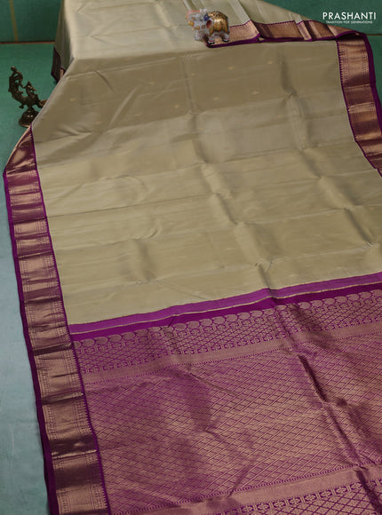 Pure kanchipuram silk saree elaichi green and purple with zari woven buttas and zari woven korvai border