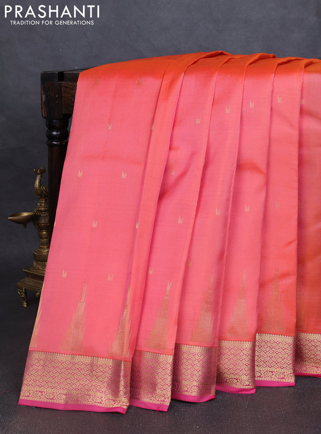 Pure kanchipuram silk saree peach orange and pink with zari woven temple buttas and rich zari woven border