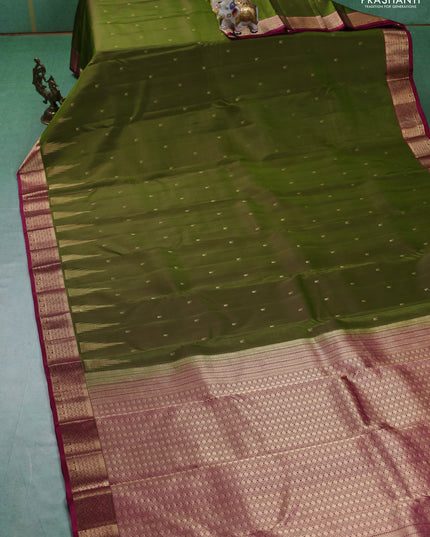 Pure kanchipuram silk saree mehendi green and magenta pink with zari woven temple buttas and rich zari woven border