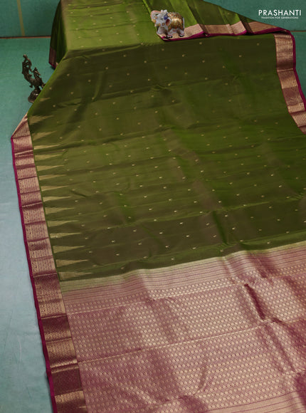 Pure kanchipuram silk saree mehendi green and magenta pink with zari woven temple buttas and rich zari woven border