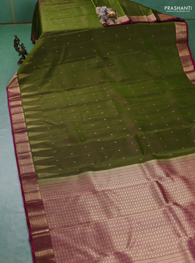 Pure kanchipuram silk saree mehendi green and magenta pink with zari woven temple buttas and rich zari woven border