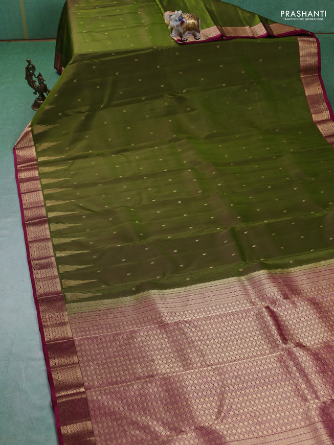 Pure kanchipuram silk saree mehendi green and magenta pink with zari woven temple buttas and rich zari woven border