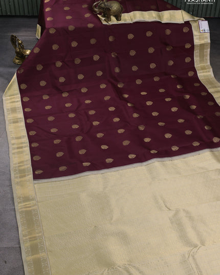 Pure kanchipuram silk saree deep maroon and cream with annam zari woven buttas and zari woven korvai border