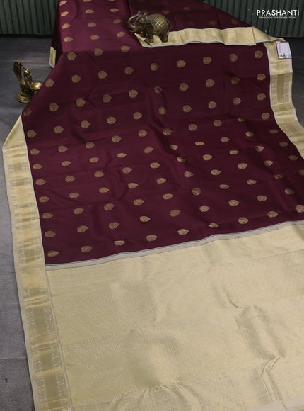 Pure kanchipuram silk saree deep maroon and cream with annam zari woven buttas and zari woven korvai border
