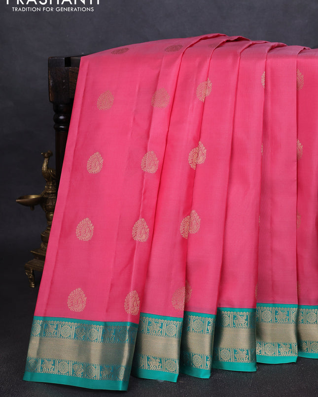 Pure kanchipuram silk saree peach pink and teal green with annam zari woven buttas and zari woven korvai border