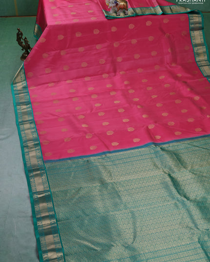 Pure kanchipuram silk saree peach pink and teal green with annam zari woven buttas and zari woven korvai border