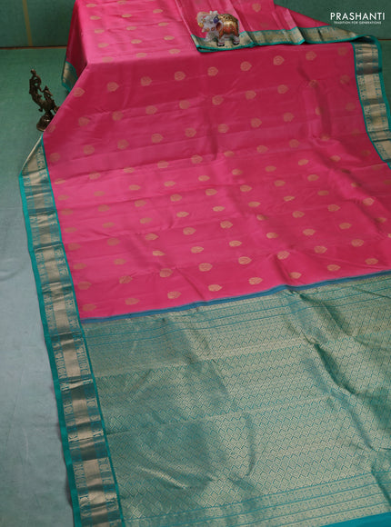 Pure kanchipuram silk saree peach pink and teal green with annam zari woven buttas and zari woven korvai border