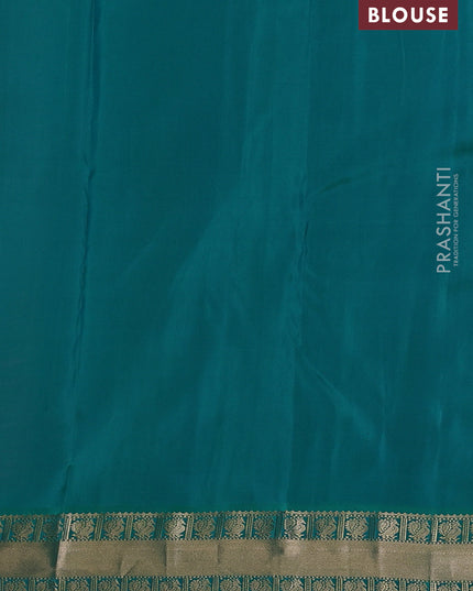 Pure kanchipuram silk saree peach pink and teal green with annam zari woven buttas and zari woven korvai border