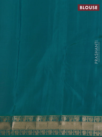 Pure kanchipuram silk saree peach pink and teal green with annam zari woven buttas and zari woven korvai border