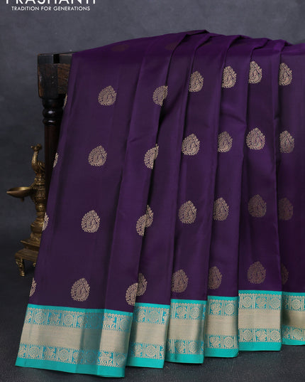 Pure kanchipuram silk saree dark purple and teal green with annam zari woven buttas and zari woven korvai border