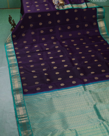 Pure kanchipuram silk saree dark purple and teal green with annam zari woven buttas and zari woven korvai border