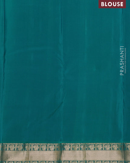 Pure kanchipuram silk saree dark purple and teal green with annam zari woven buttas and zari woven korvai border
