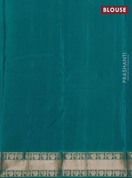 Pure kanchipuram silk saree dark purple and teal green with annam zari woven buttas and zari woven korvai border