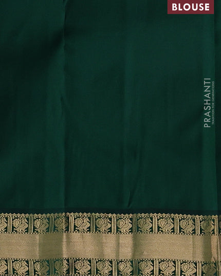 Pure kanchipuram silk saree pista green and green with annam zari woven buttas and zari woven korvai border