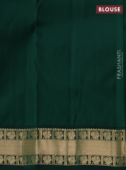 Pure kanchipuram silk saree pista green and green with annam zari woven buttas and zari woven korvai border