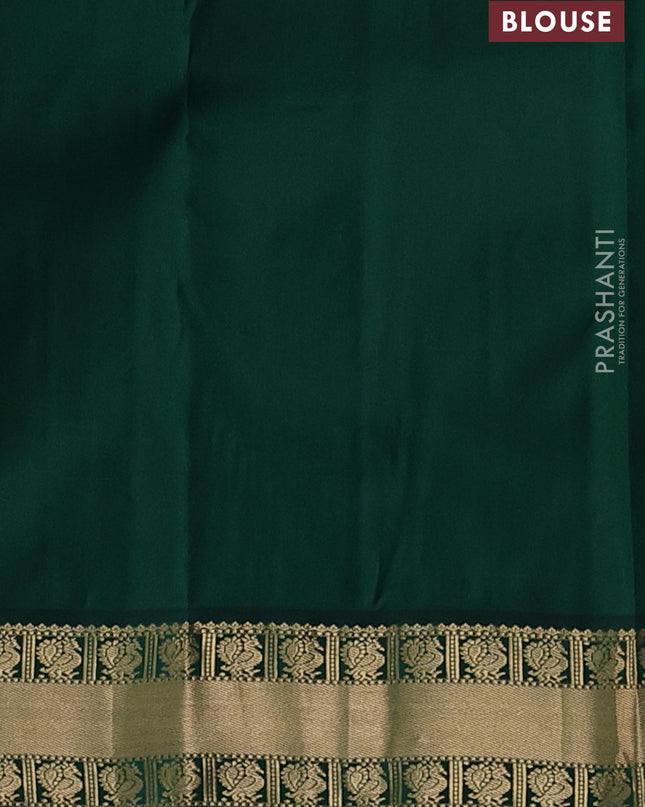 Pure kanchipuram silk saree pista green and green with annam zari woven buttas and zari woven korvai border