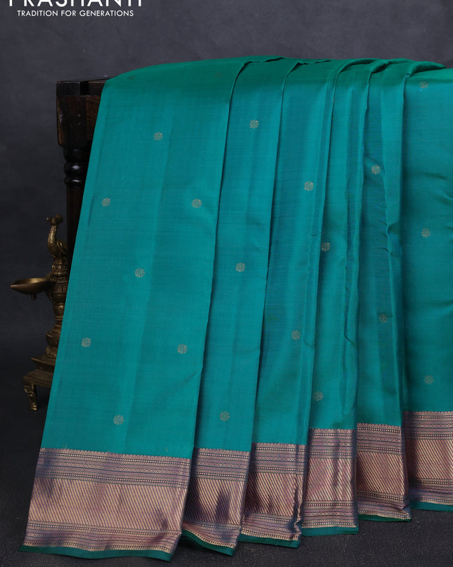 Pure kanchipuram silk saree teal green and purple with zari woven buttas and zari woven border