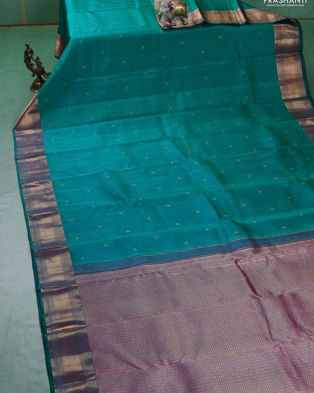 Pure kanchipuram silk saree teal green and purple with zari woven buttas and zari woven border