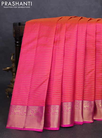 Pure kanchipuram silk saree dual tone pinkish orange and pink with allover zari stripe pattern and rich zari woven border