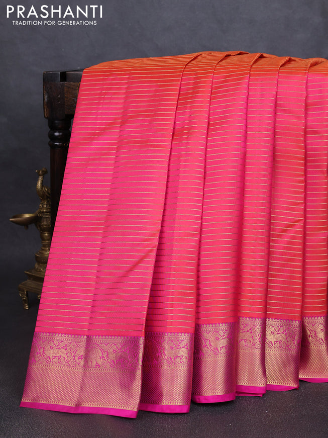 Pure kanchipuram silk saree dual tone pinkish orange and pink with allover zari stripe pattern and rich zari woven border